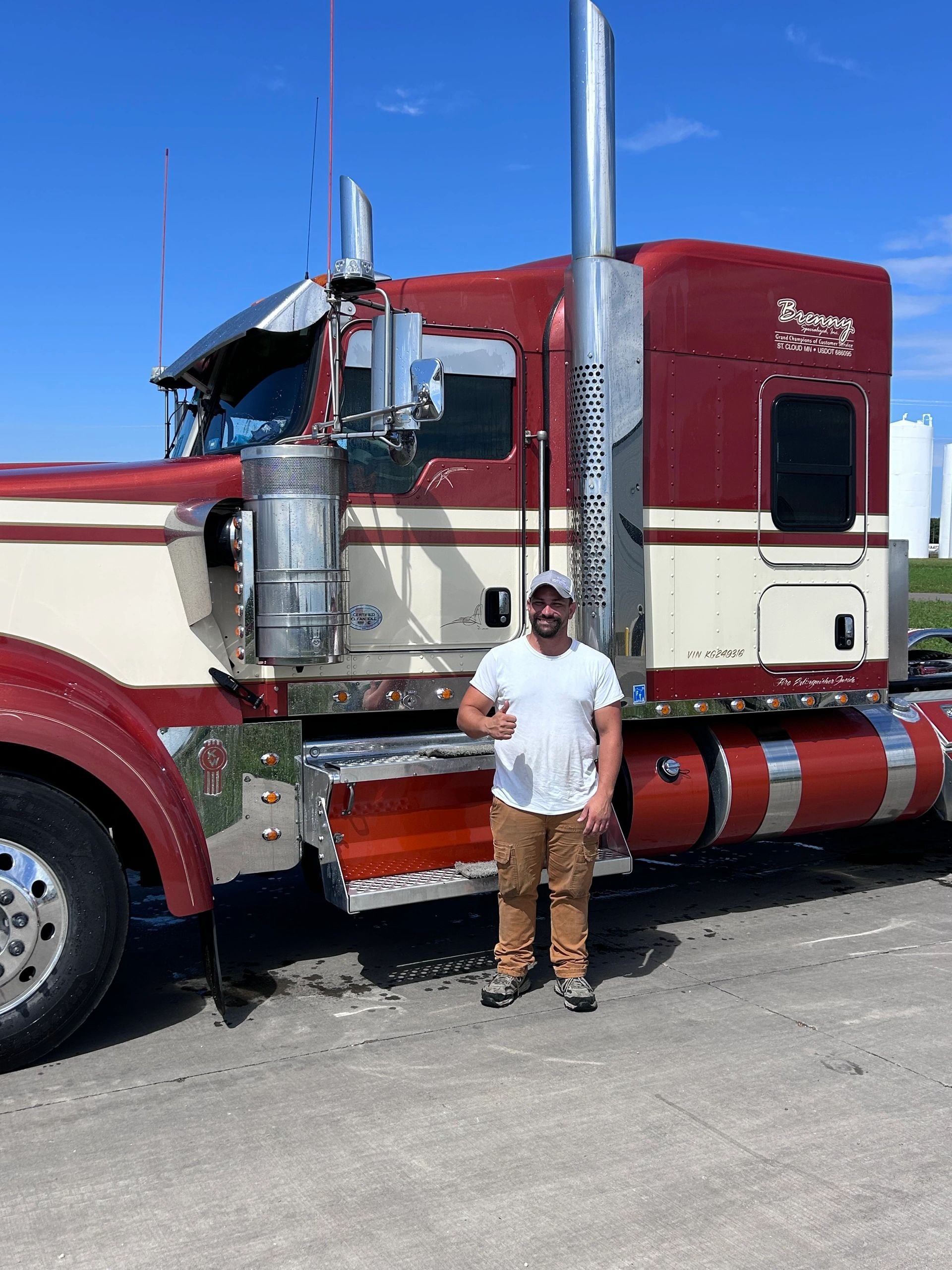 Man standing in front of custom semi-truck