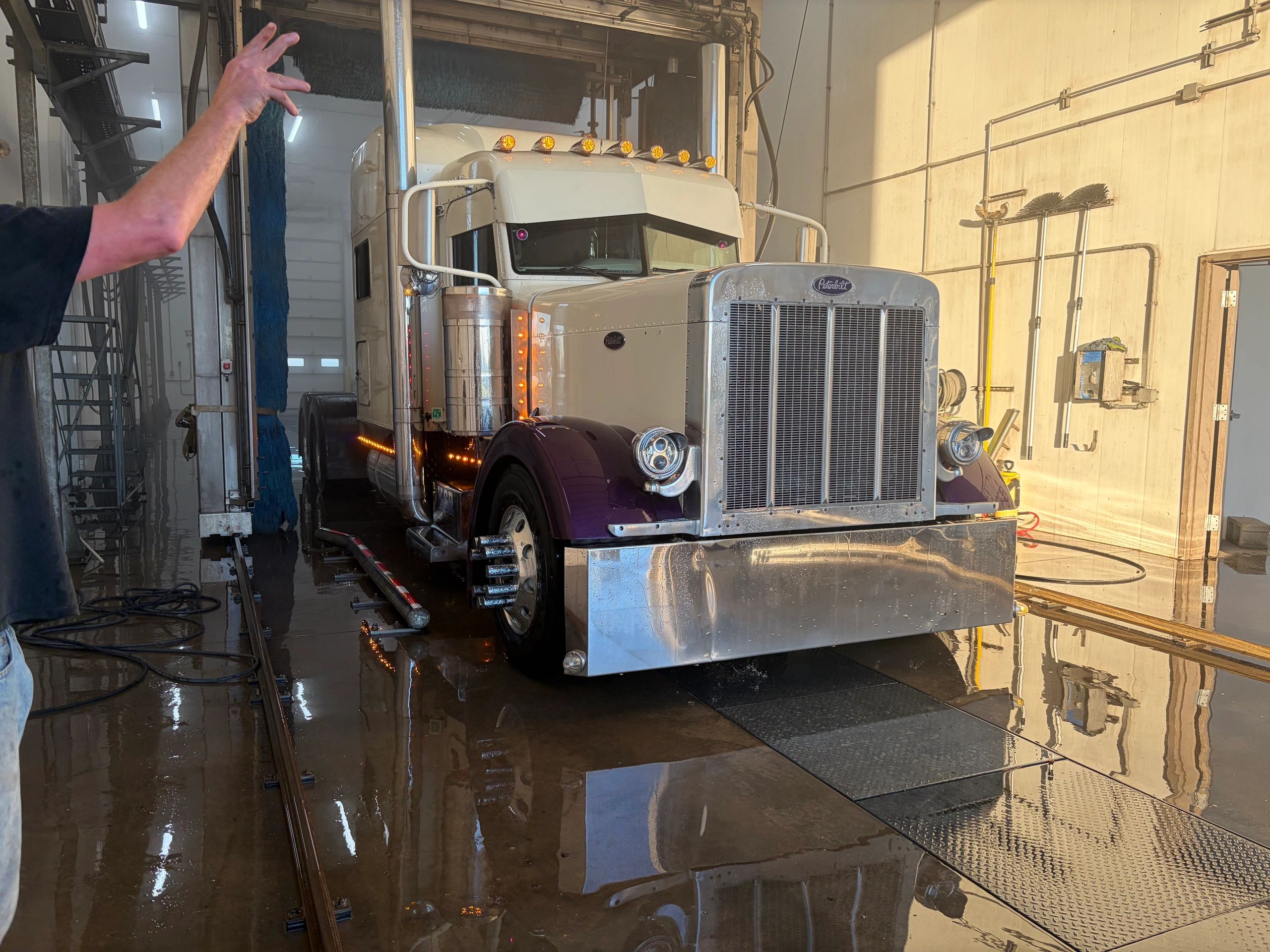 Vintage Peterbilt semi-truck with polished aluminum trailer